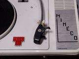 a close up of a turntable with a record on it