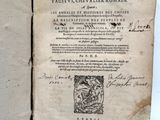 an open book with a picture of a man on it