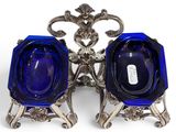 pair of cobalt blue glass candlesticks on silver stand