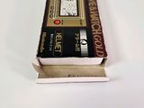 a small book sitting on top of a white table