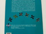 the back cover of a book with an image of a bird flying