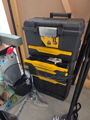 a black and yellow tool box and a black and yellow tool box