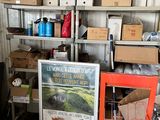 many boxes on the shelves in the garage