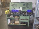 a workbench with many tools on it in a garage