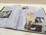 an open book with a picture of a man and a woman