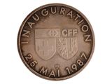 une image représentant une pièce de monnaie sur laquelle figure un blason