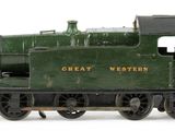 a green train on the tracks on a white background