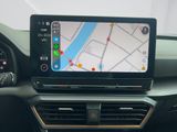 the dashboard of a car with a gps device in the center