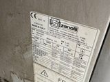 a label on the side of a refrigerator that says azzandil