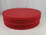 a set of four red sponge pads sitting on top of a white surface