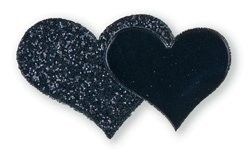 two black glittered hearts on a white background