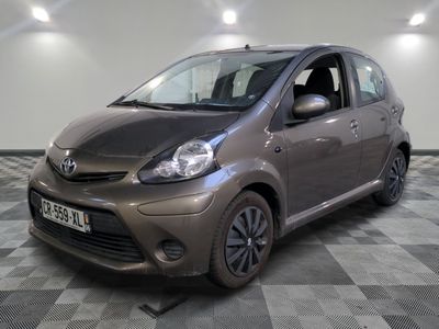 a picture of a toyota aygo in a showroom