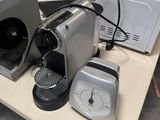a coffee maker and a toaster on a table