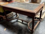 a small table with a marble top on it