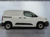 a picture of a white van parked in a garage