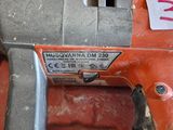 a drill that is sitting on top of a table