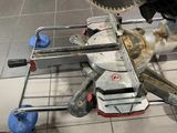 a man using a circular saw to cut a piece of metal