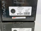 two boxes are stacked on top of each other on a table