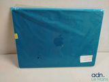 an image of a blue apple laptop sitting on top of a white table
