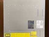 the inside of a box with a yellow label on it