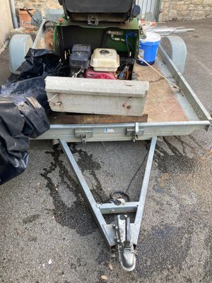 an image of a small trailer with a grill on it