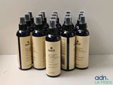 six flacons de produits de soin pour les cheveux « Avril » posés sur une table