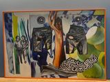 une image d'un tableau sur le mur d'une pièce