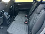 the back seats of a car are empty with no people in it