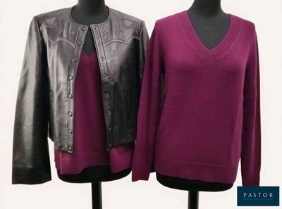 two women ' s sweaters with leather sleeves on mannequins