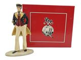 figurine of a man in a top hat with a red box behind him