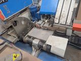 a machine that is working on a piece of machinery