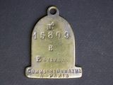 an old brass bell with the name of the city of paris on it