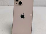 an apple iphone 11 is sitting on top of a white table
