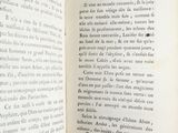 an open book with a picture of a bird on it