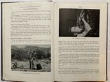 an open book with a picture of a man and a woman