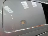 a close up of a car door with a hole in the side of it