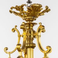 Lustre à dix lumières, en bronze doré et verre taillé, de st… (photo 4)