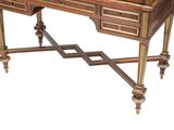a wooden desk with two drawers and a mirror on it