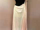 black and white draped dress on a mannequin mannequin mannequin mannequin mannequin mannequin mannequin mannequin mann