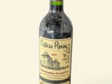 a bottle of wine that is sitting on a table