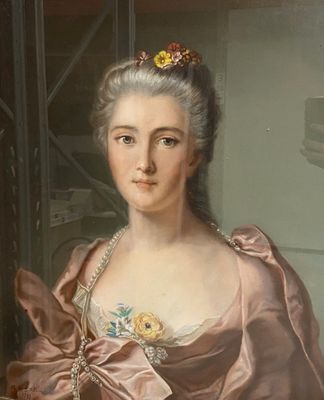portrait of a woman in a pink dress with a flower in her hair