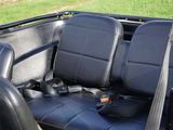 two seats in the back of a car with a seat belt