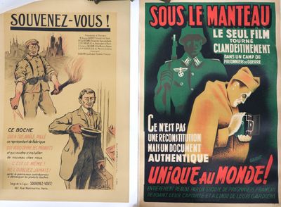 two posters on the wall of a building