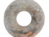 a donut that is sitting on a white surface