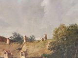 a painting on the wall of a house with a horse drawn carriage