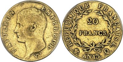a gold coin with an image of a man ' s face on it