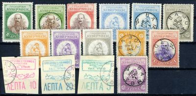 several different stamps of different colors and sizes on a black surface