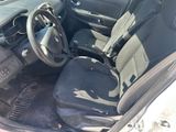 a car that has a steering wheel and a seat in it