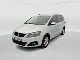 a white car parked in a white room with a white floor