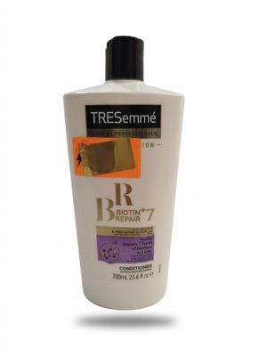 a bottle of tresseme hair lotion on a white background